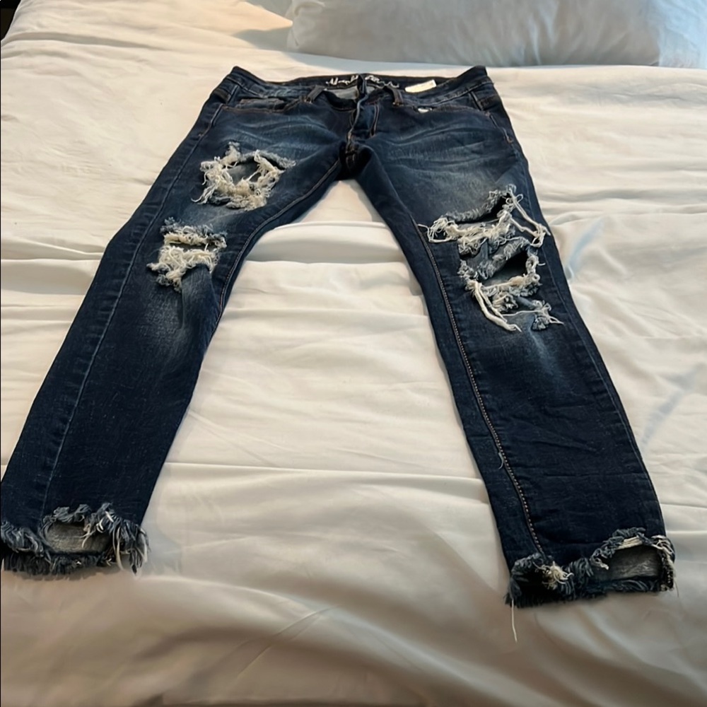 Distressed Blue Jeans